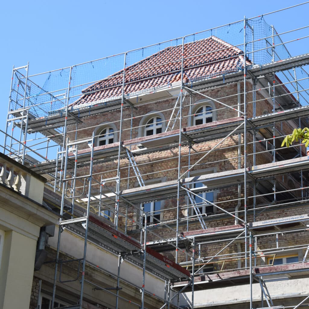 Scaffolded,Building,For,The,Renovation,Of,The,Facade